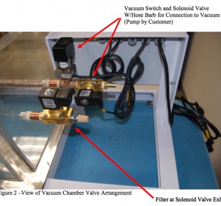 arrangement of valves on clear acrylic vacuum chamber with VCC system